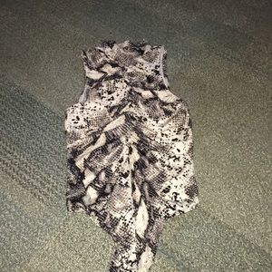 Body suit scale pattern stenches down the middle size medium.